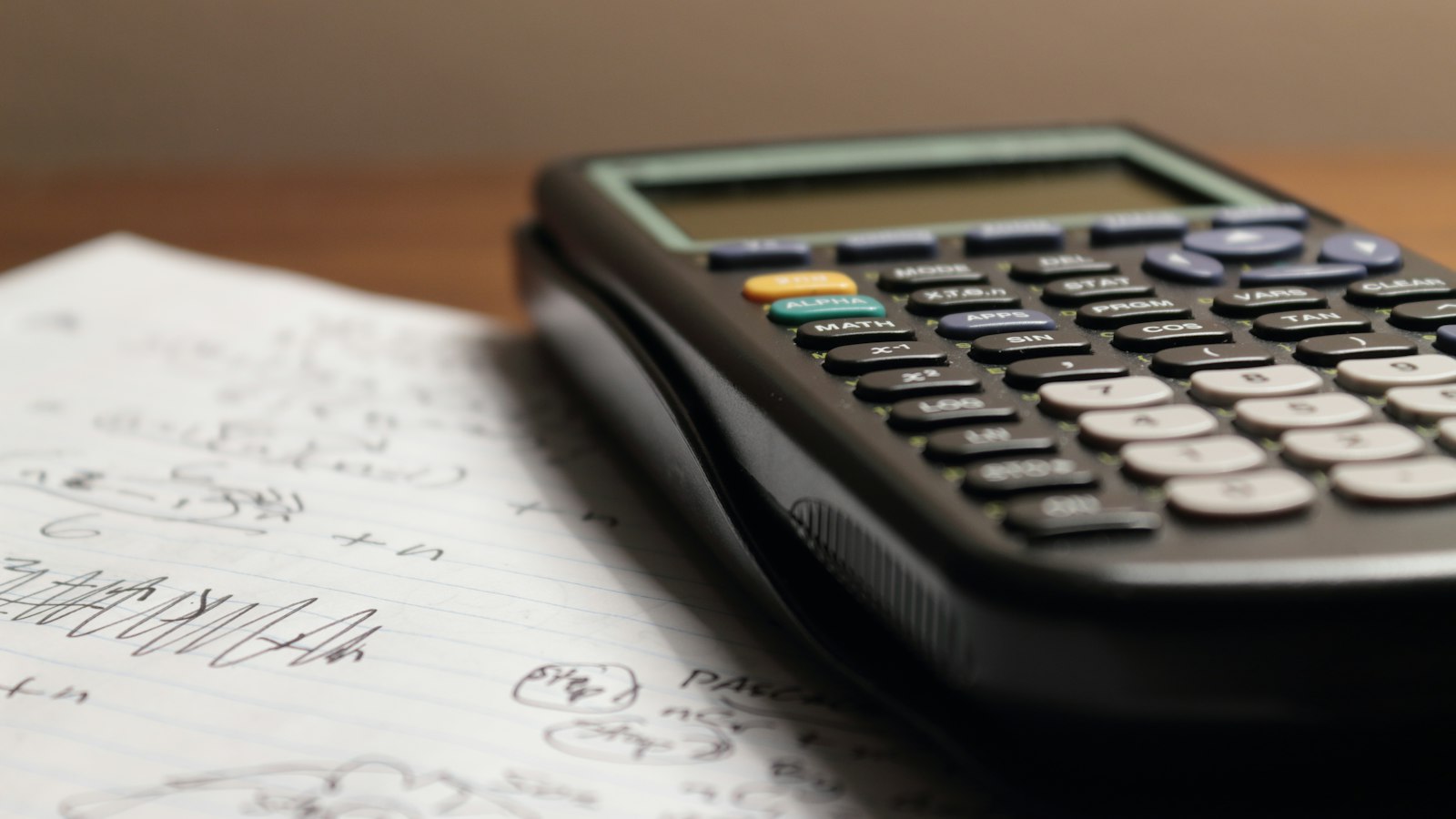 Calculator on a sheet of paper for converting marks to grade points